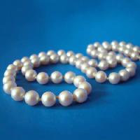 Pixwords Com a imagem mármores, bolas, azul, colar Susan Quinland-stringer - Dreamstime